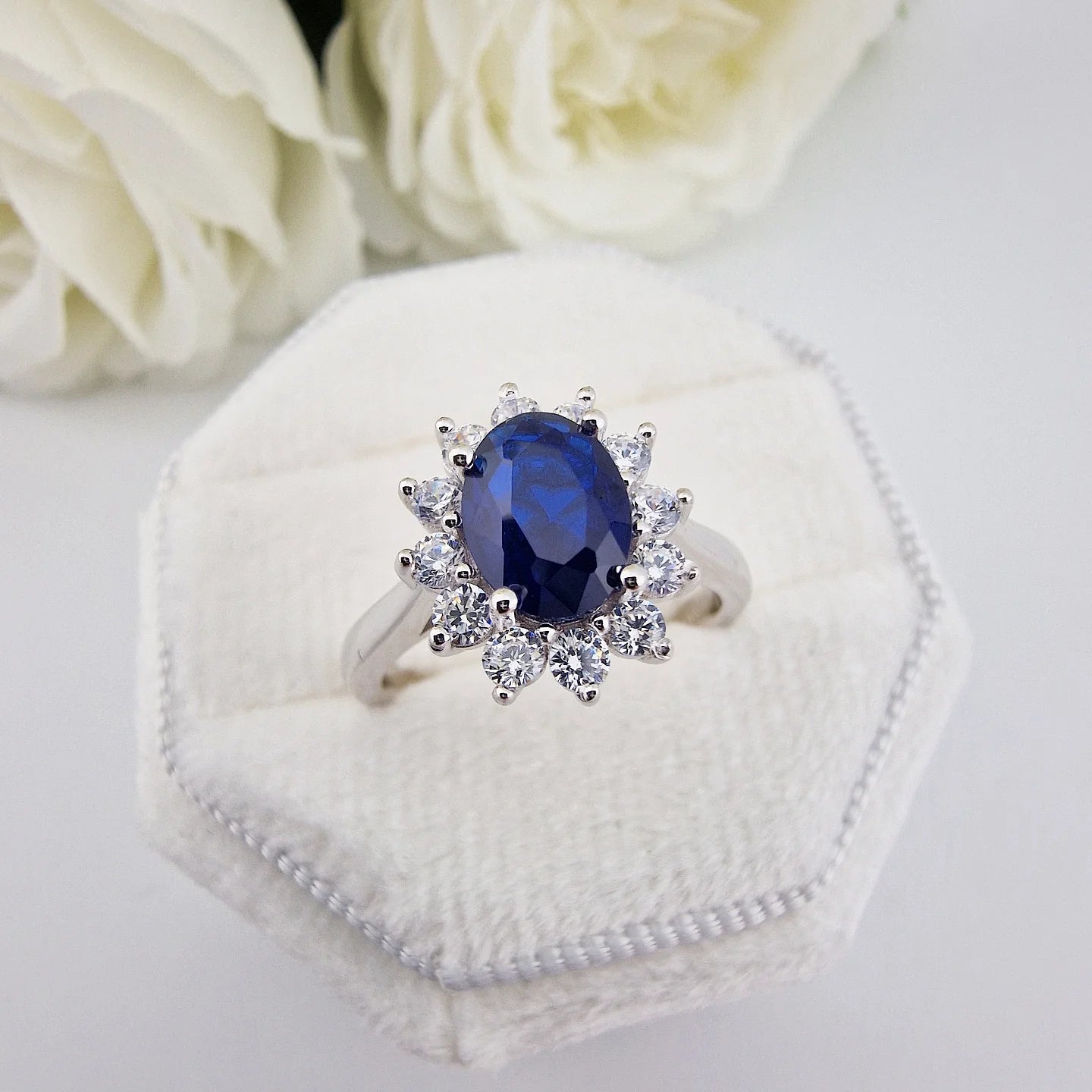 925 Sterling Silver Oval Blue Sapphire Cz Regal Halo Ring