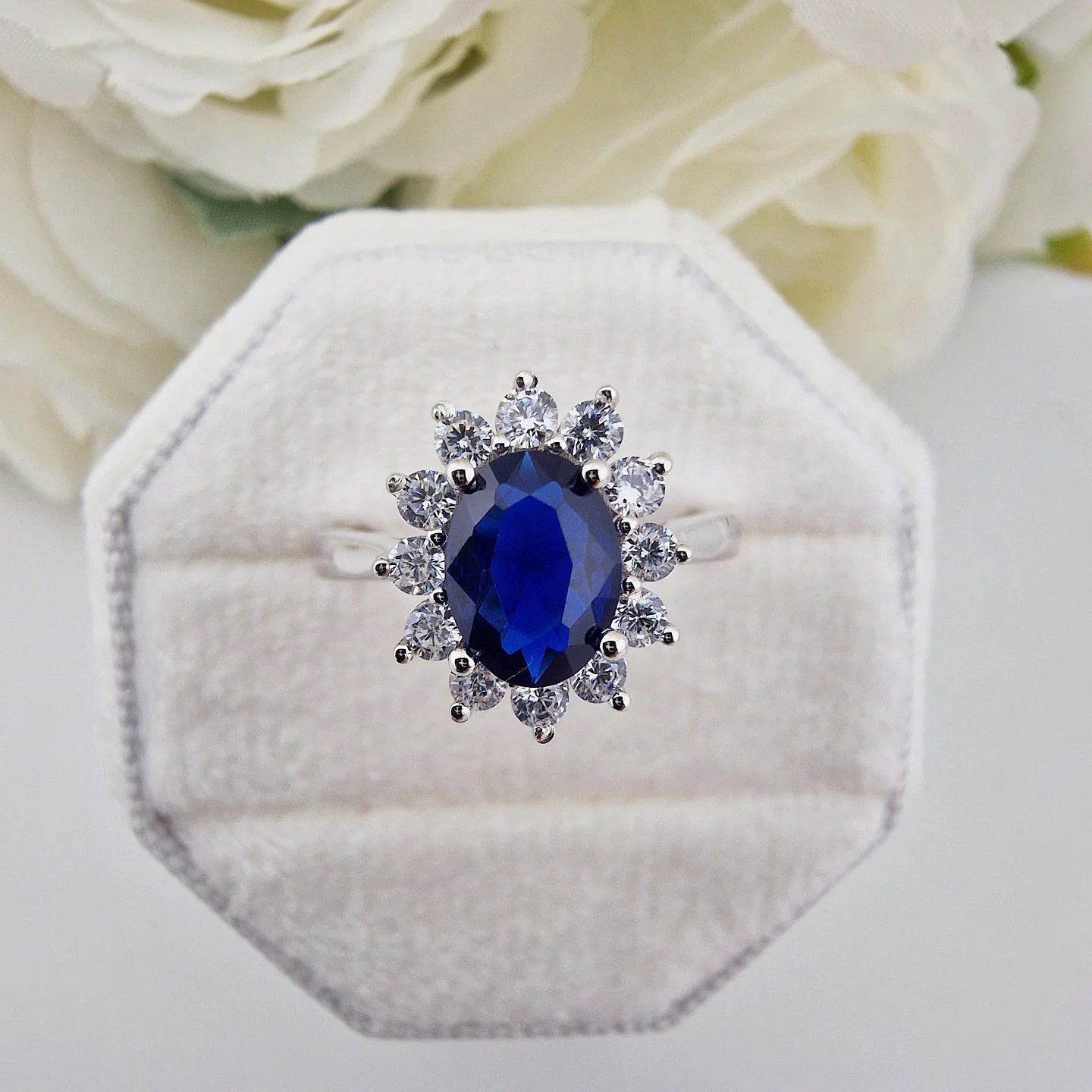 925 Sterling Silver Oval Blue Sapphire Cz Regal Halo Ring