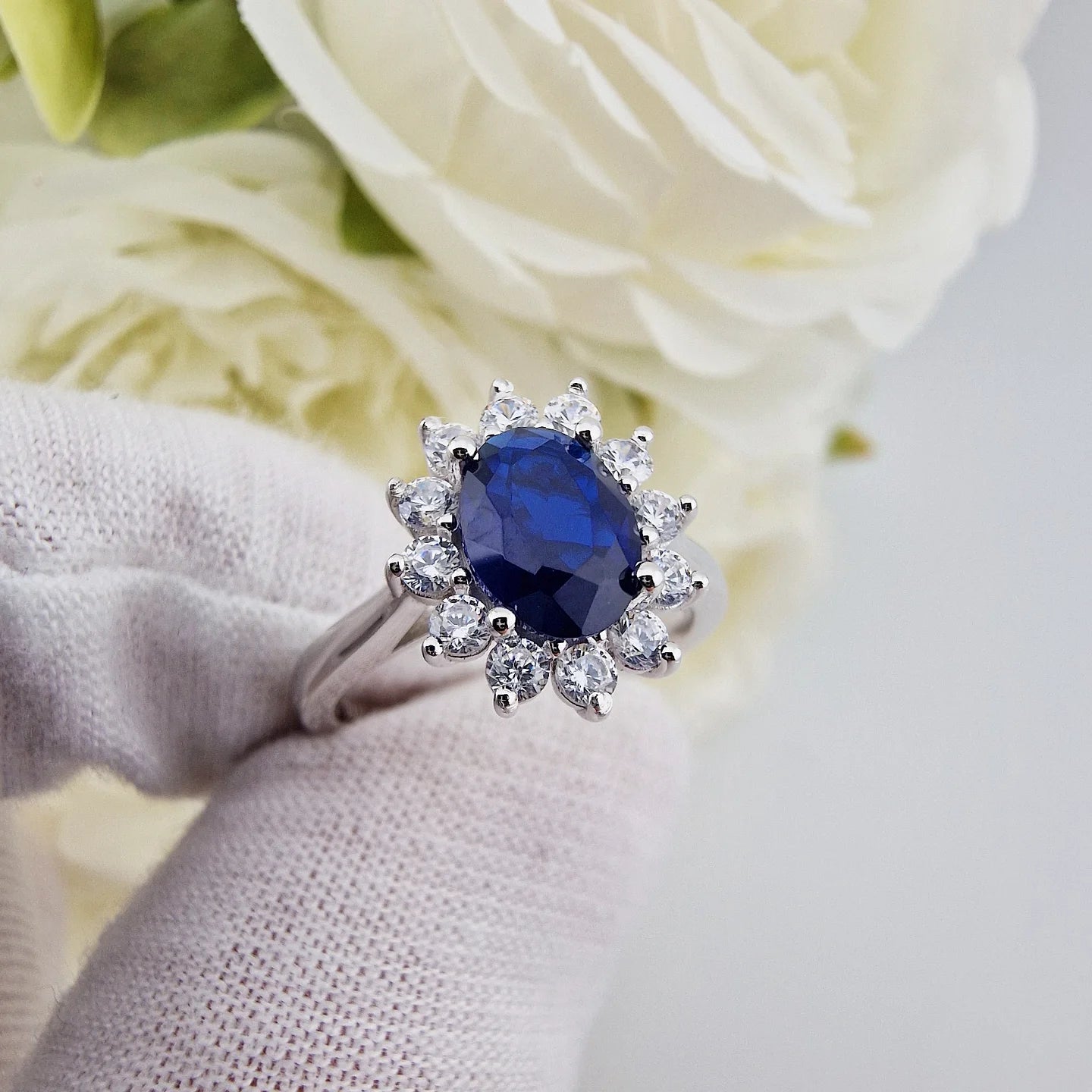 925 Sterling Silver Oval Blue Sapphire Cz Regal Halo Ring