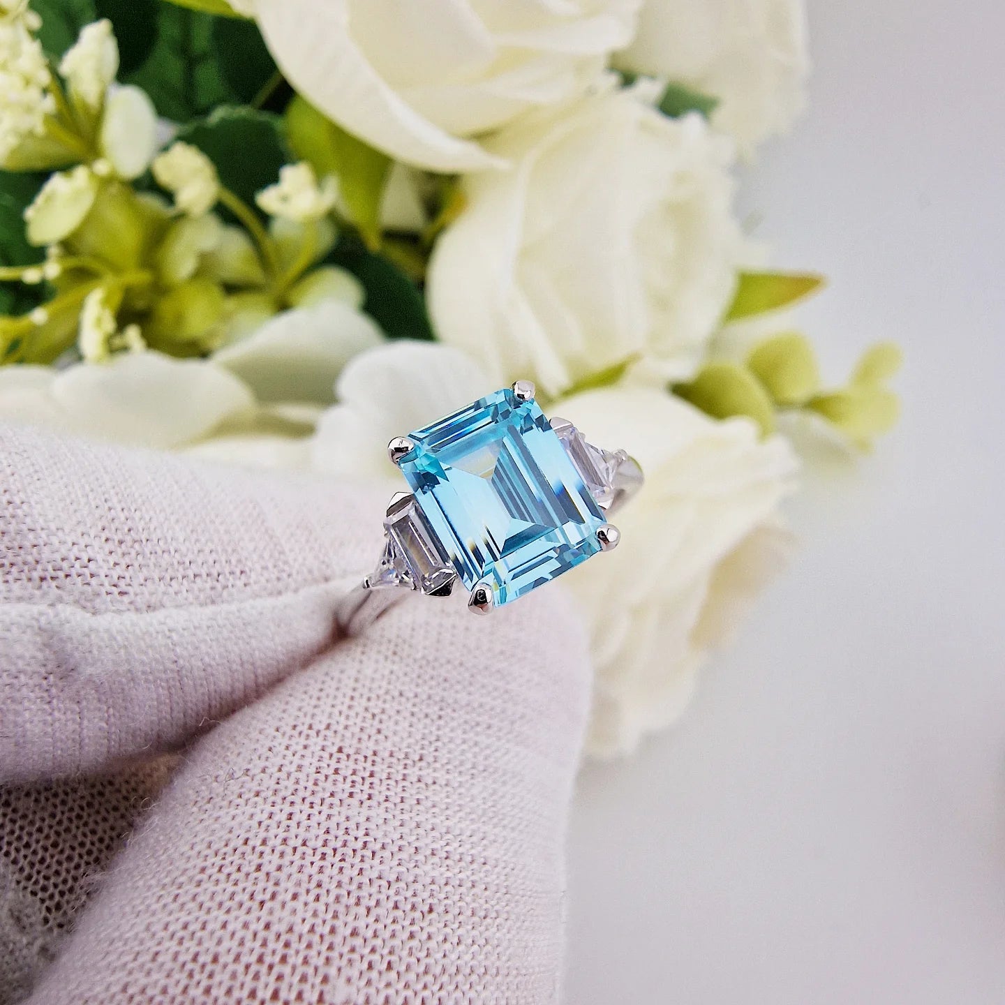 925 Sterling Silver Aqua CZ Emerald Cut Ring with Trillion Side Stones
