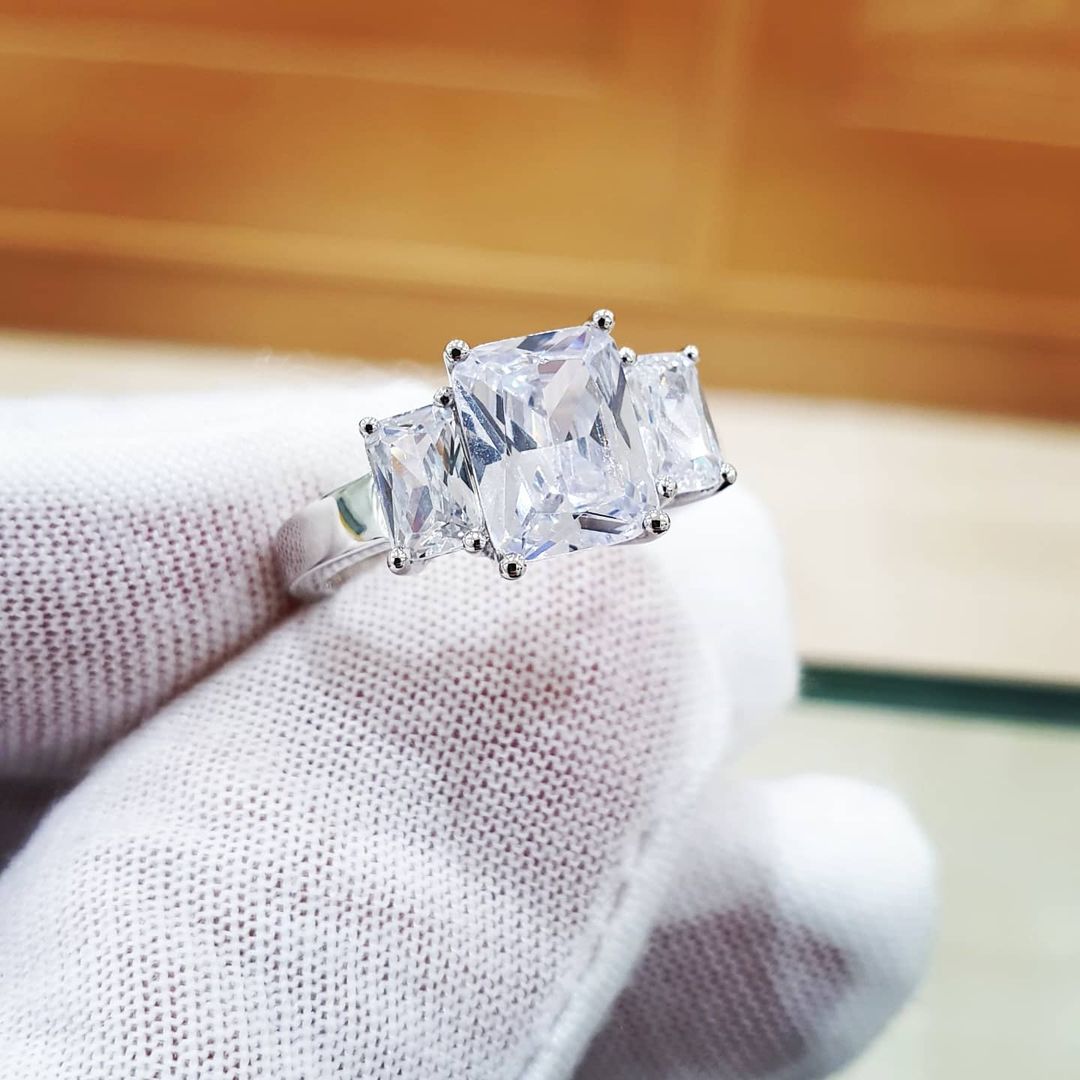 925 Sterling Silver Claw Set Emerald Cut Cz Trilogy Ring
