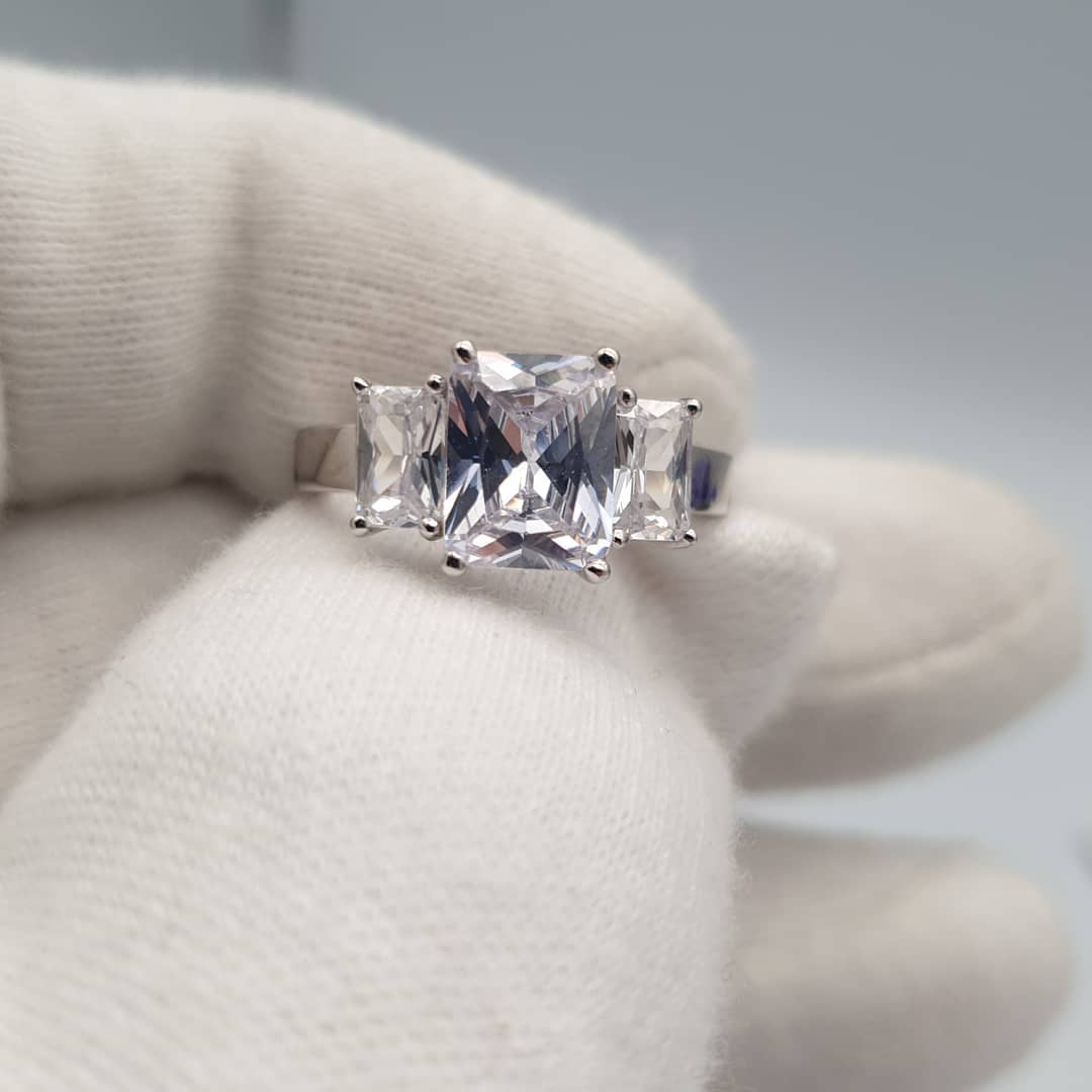 925 Sterling Silver Claw Set Emerald Cut Cz Trilogy Ring