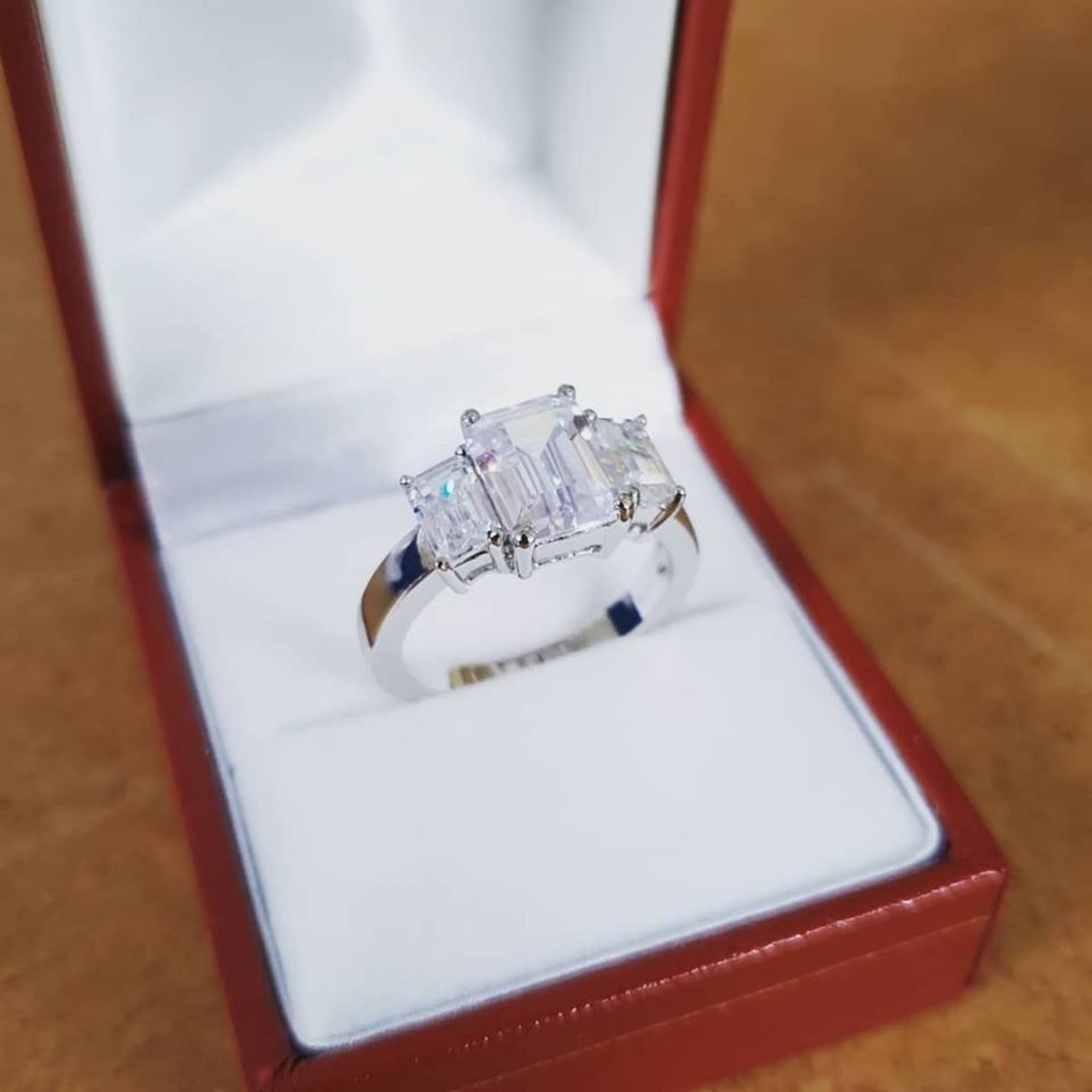 925 Sterling Silver Claw Set Emerald Cut Cz Trilogy Ring