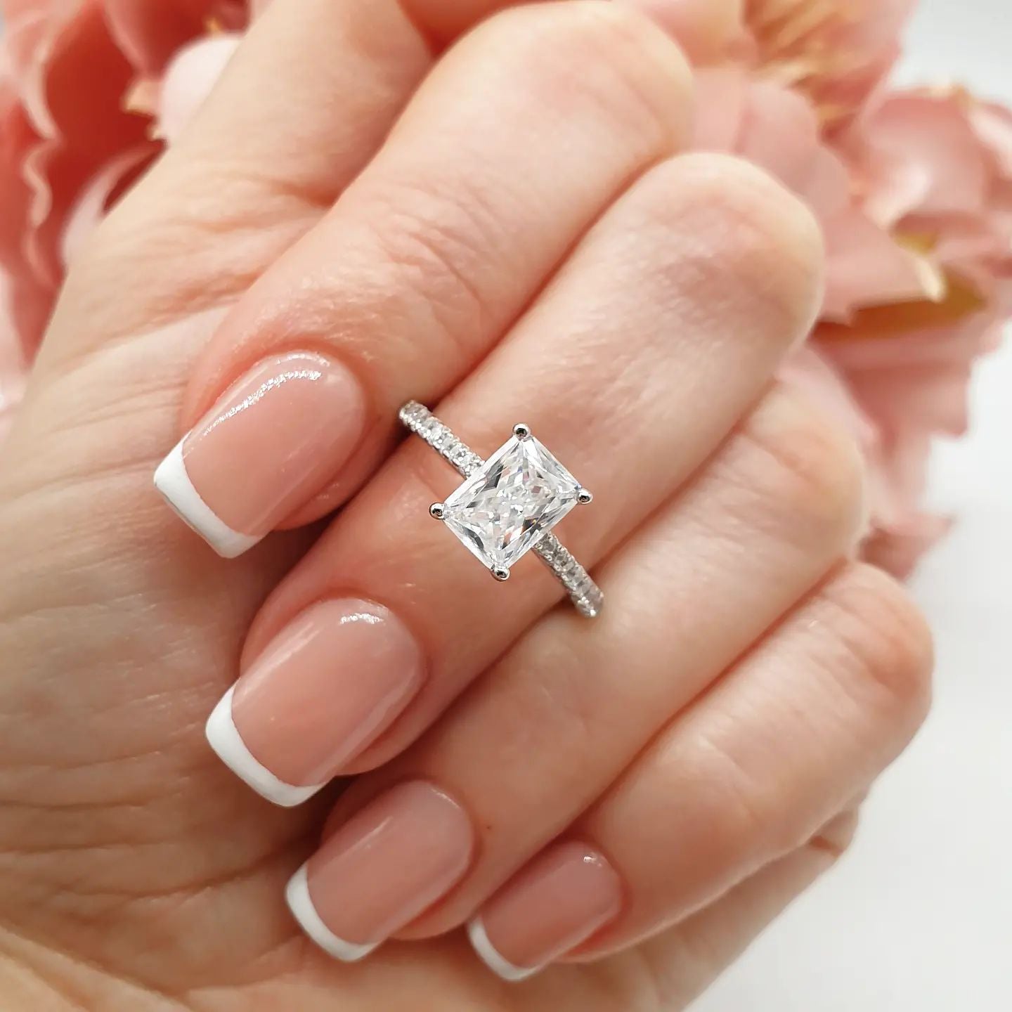 925 Sterling Silver Cz Emerald Cut with Round Cz Shoulders Ring