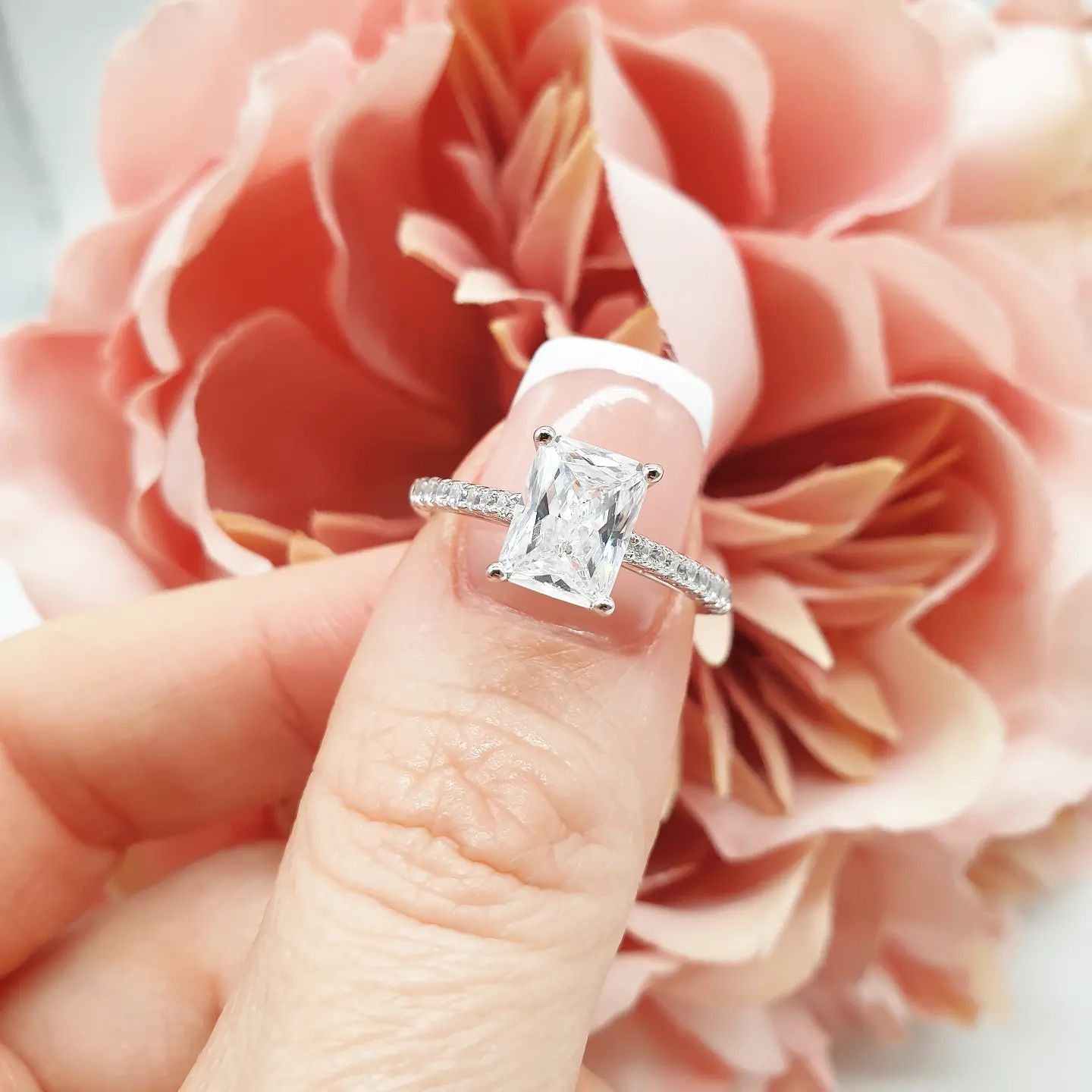 925 Sterling Silver Cz Emerald Cut with Round Cz Shoulders Ring