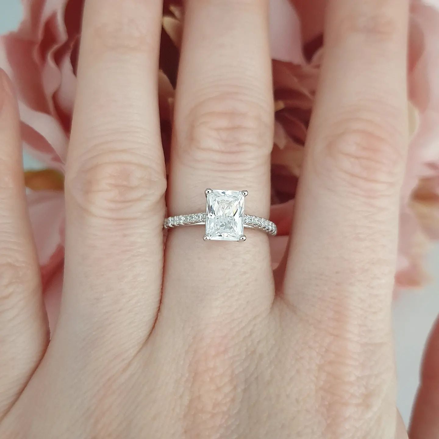 925 Sterling Silver Cz Emerald Cut with Round Cz Shoulders Ring