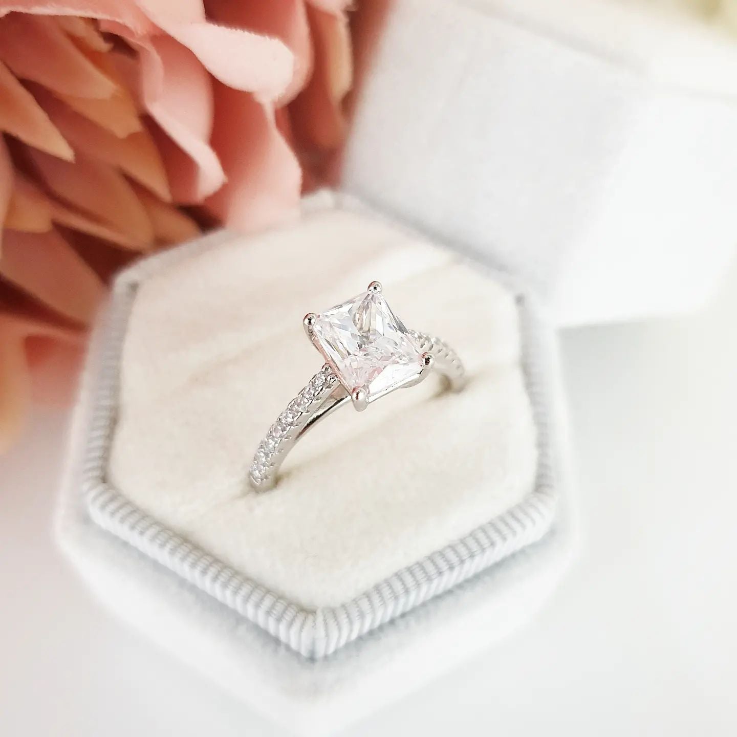 925 Sterling Silver Cz Emerald Cut with Round Cz Shoulders Ring
