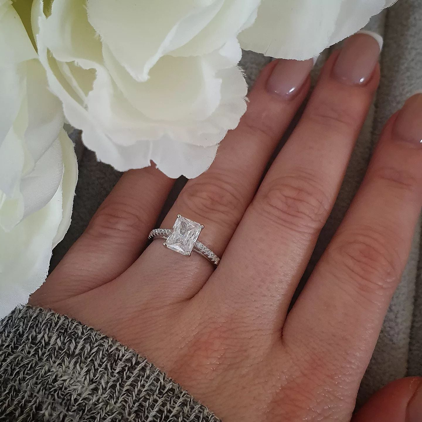 925 Sterling Silver Cz Emerald Cut with Round Cz Shoulders Ring