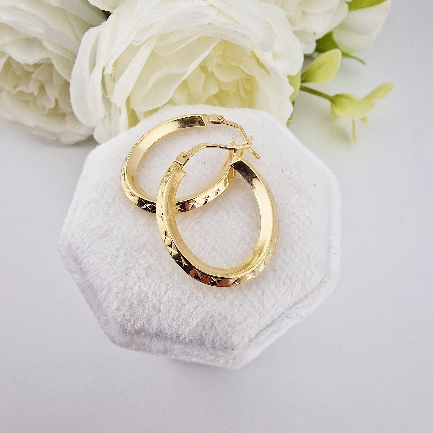 9ct Yellow Gold Diamond Cut Oval Hoop Earrings