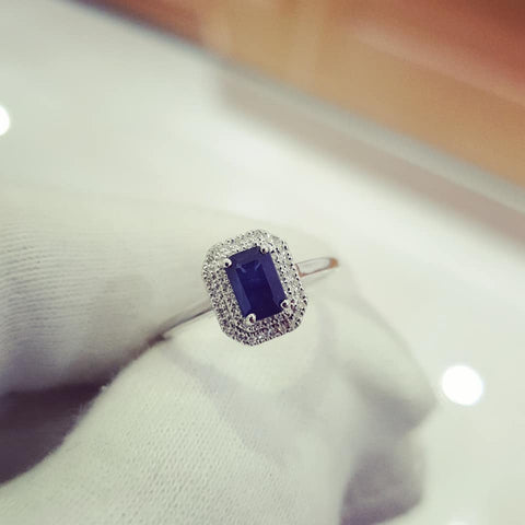 9ct White Gold Double 0.10ctw Diamond Halo Ring with 0.70ct Emerald Cut Sapphire